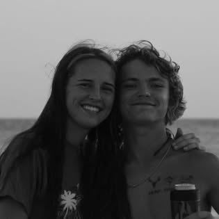 Friends on the beach at dusk